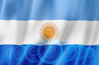 Crypto coins with Argentina flag on background 